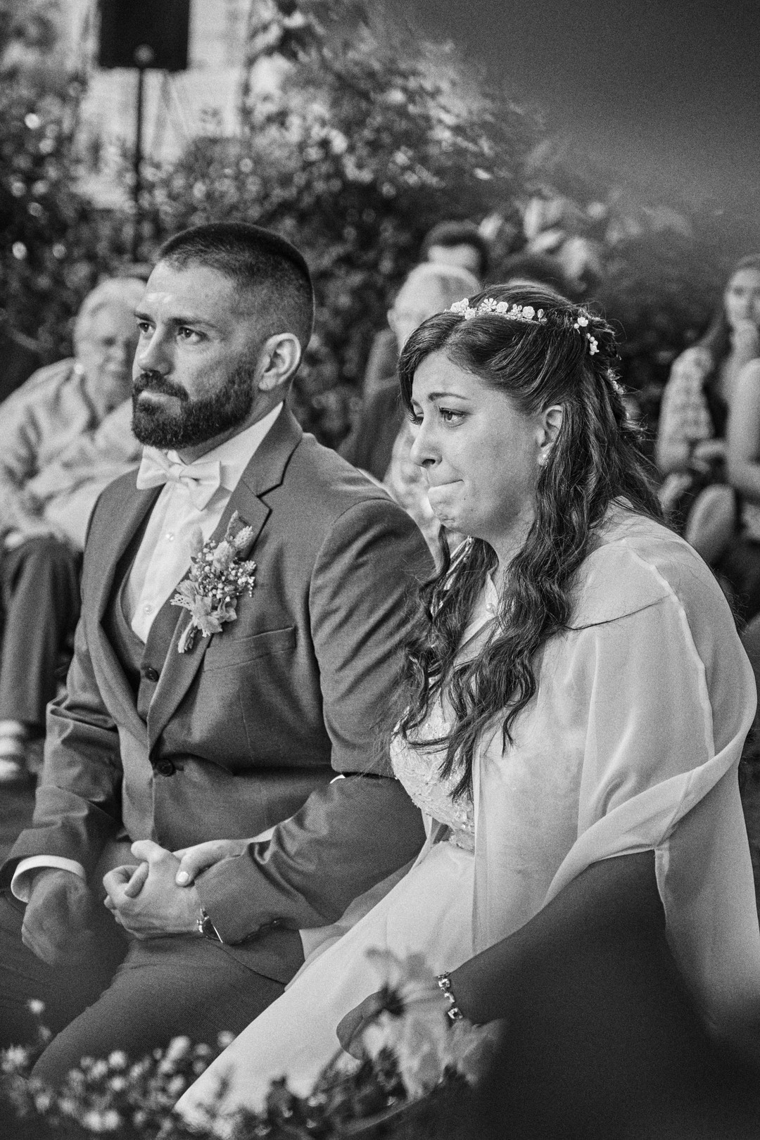 Miriam and Alejandro sit together during the ceremony.