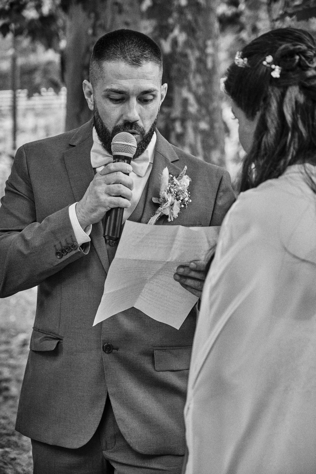 Alejandro reads a few words to Miriam.