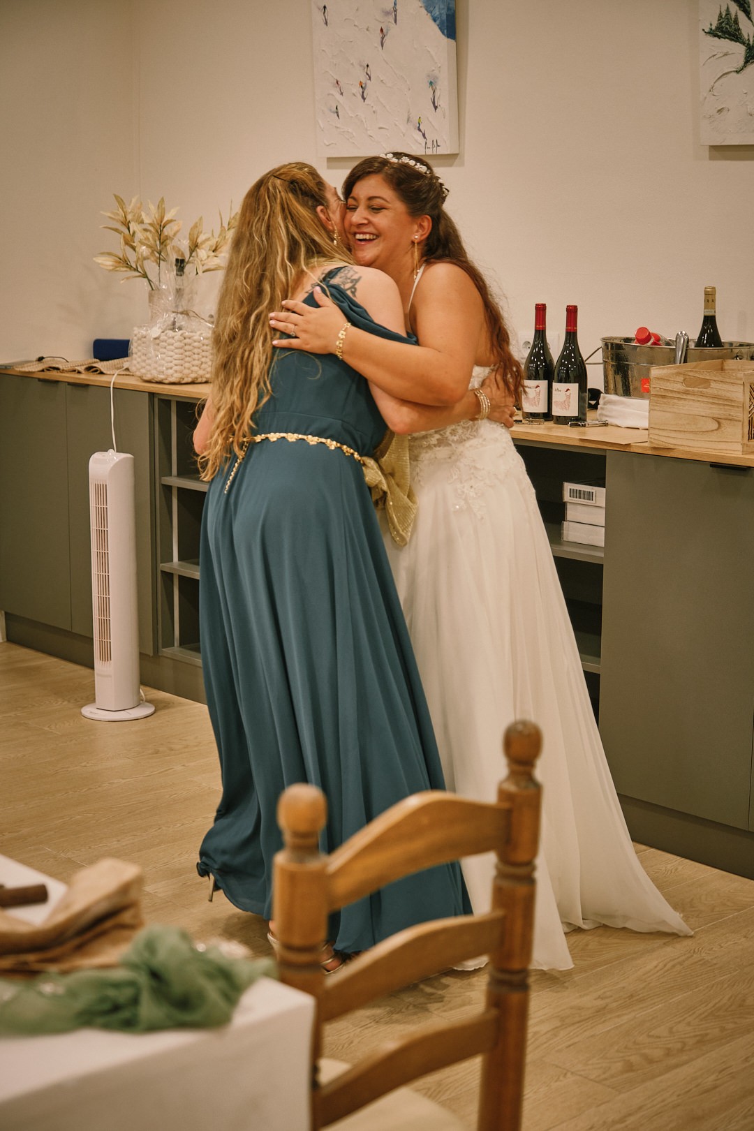 Miriam embraces a guest on the dance floor.