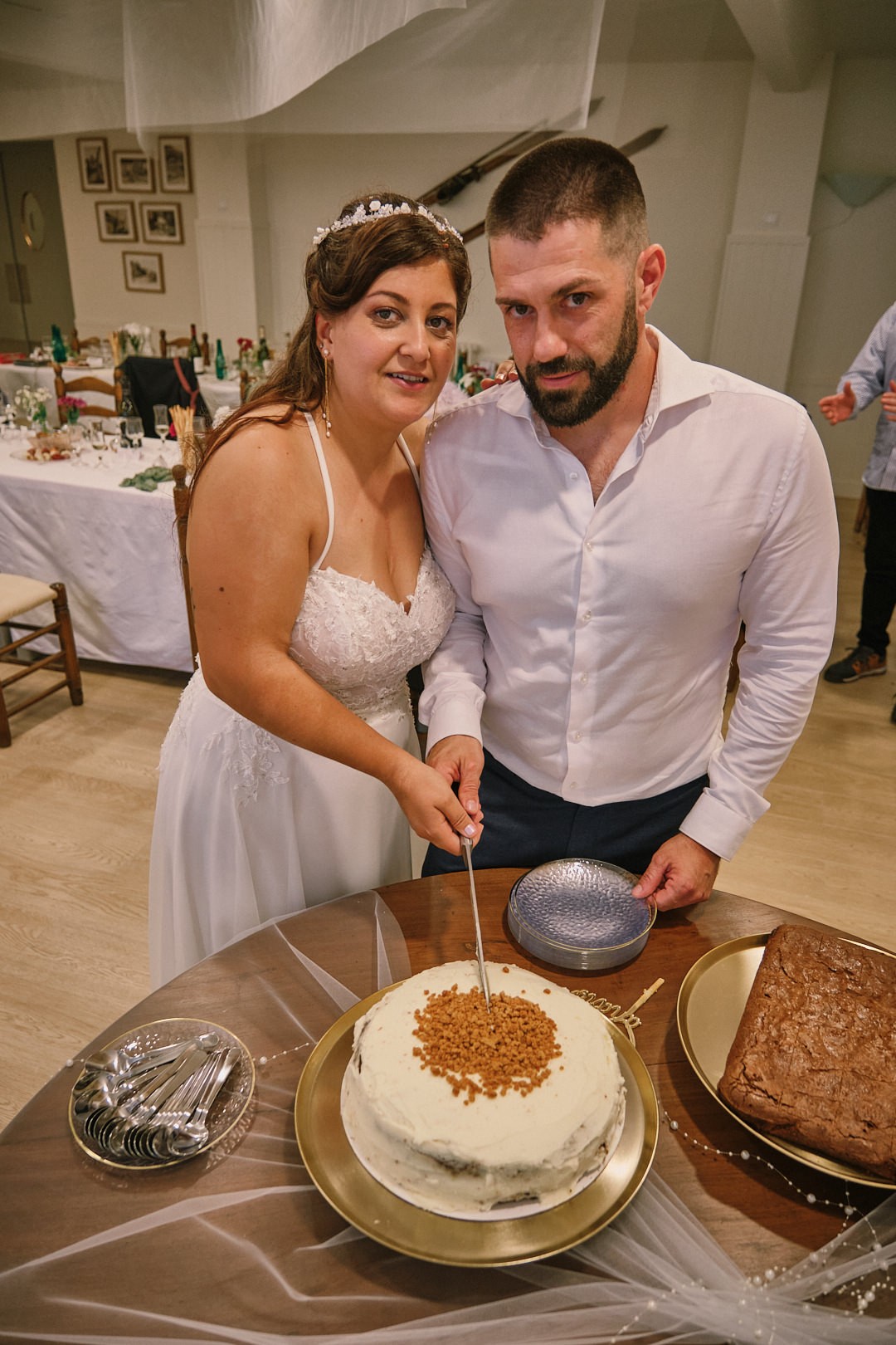 Miriam and Alejandro cut their wedding cake.